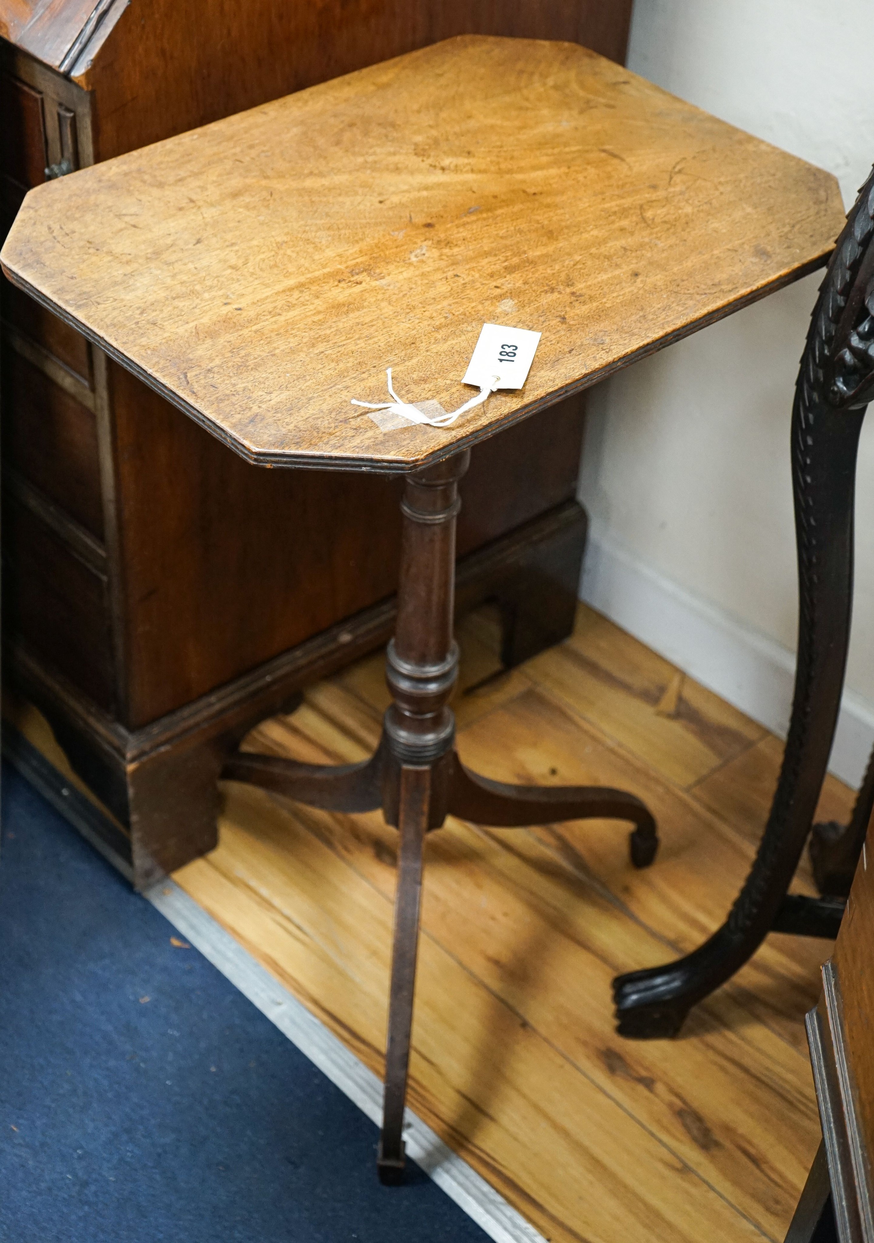 A 19th century mahogany octagonal tilt-top occasional table, the octagonal top on turned column and tripartie base, width 51cm, depth 38cm, height 74cm